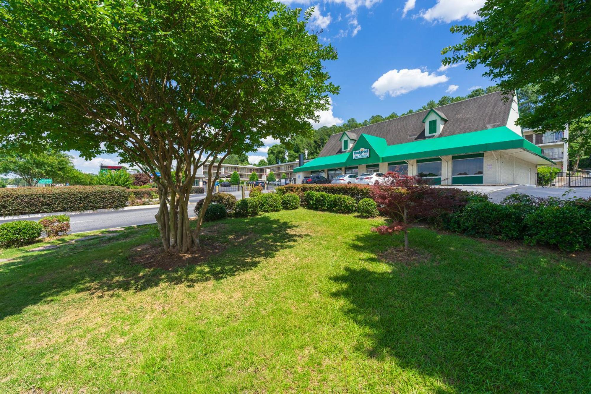 Budgetel Inn And Suites Lodge West Exterior foto